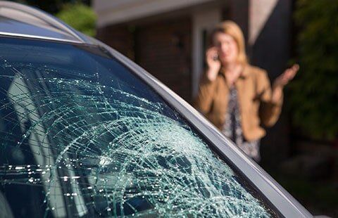 Capital Auto Glass technician performing windshield replacement